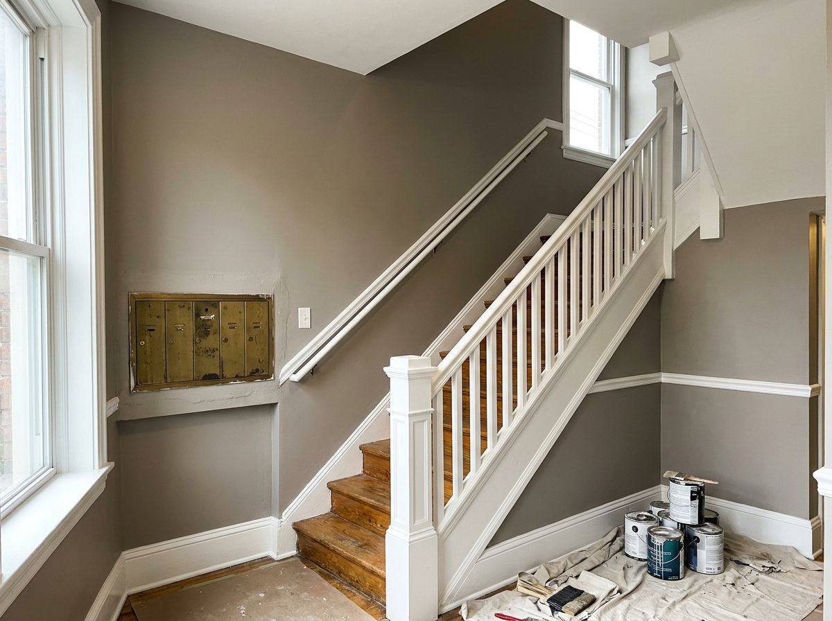 Commercial lobby and stair repaint in a Massachusetts mixed-use building