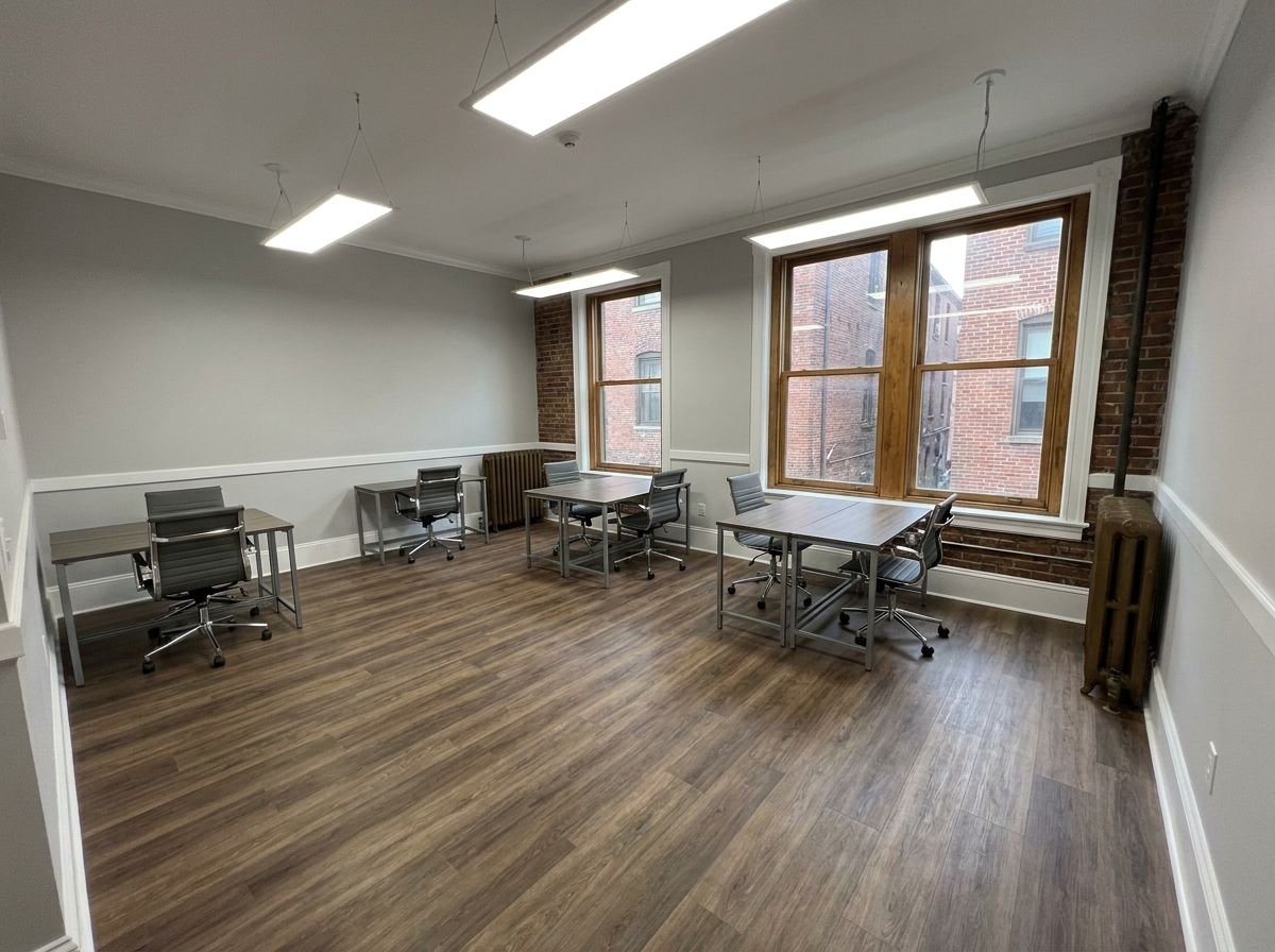 Office remodel and layout refresh in an older Massachusetts commercial building