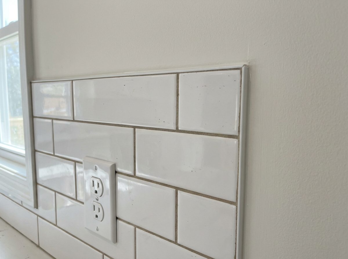 New subway tile backsplash detail in a Massachusetts kitchen