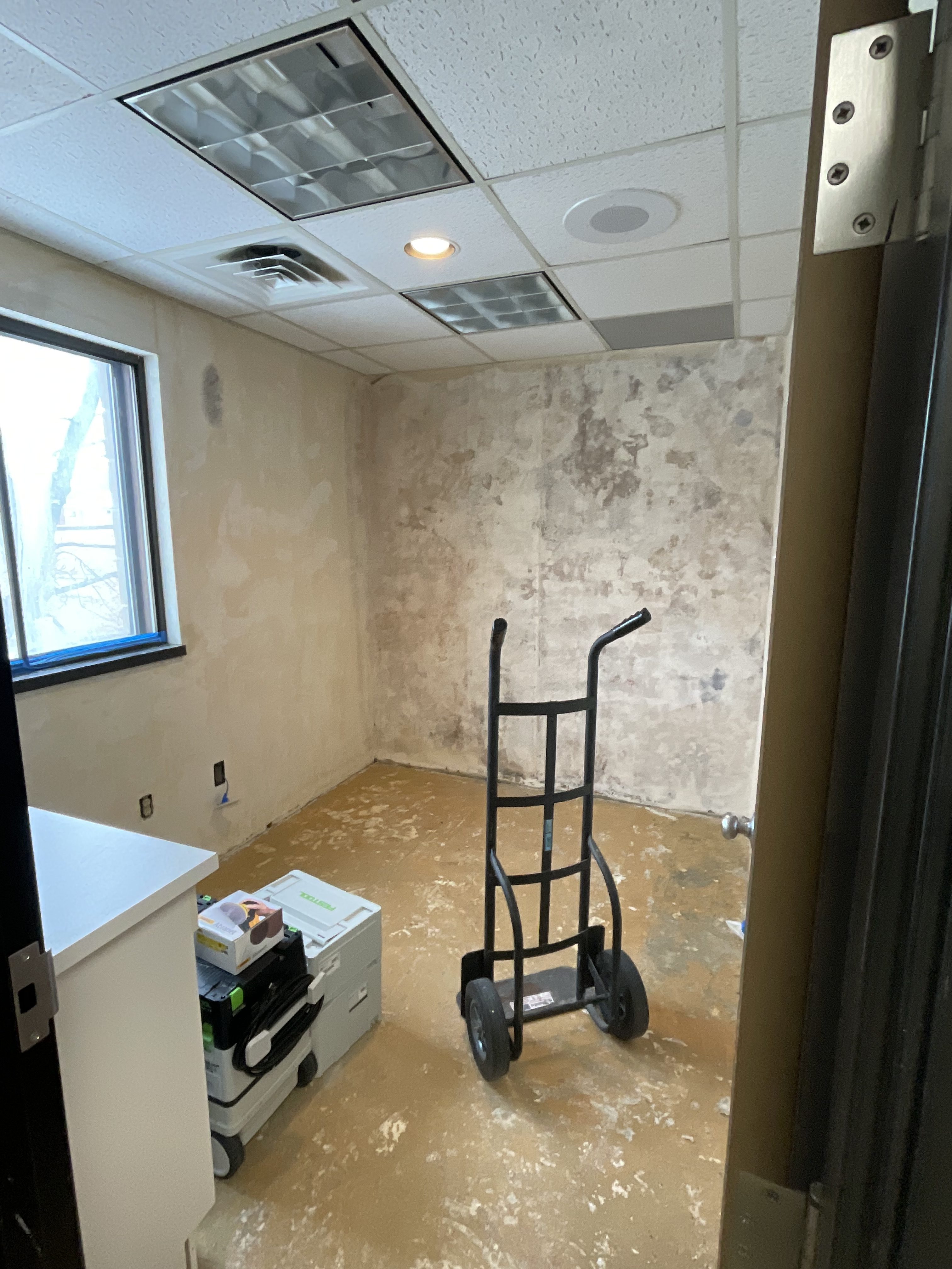 Commercial office renovation in Worcester, MA - LVP flooring, wallpaper removal, skim coating, and painting by JP Creative Maintenance (4)