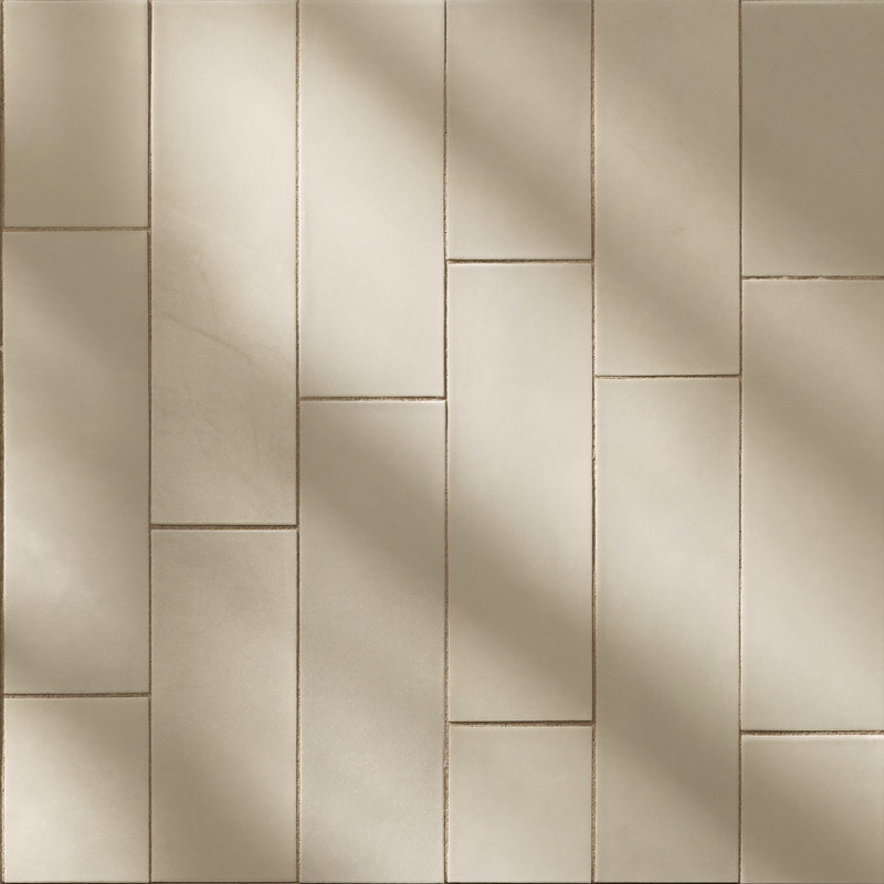Macro photograph of soft cream rectangular ceramic tile with a gentle satin glaze and thin taupe grout lines, plain field tile only, every course straight and flat