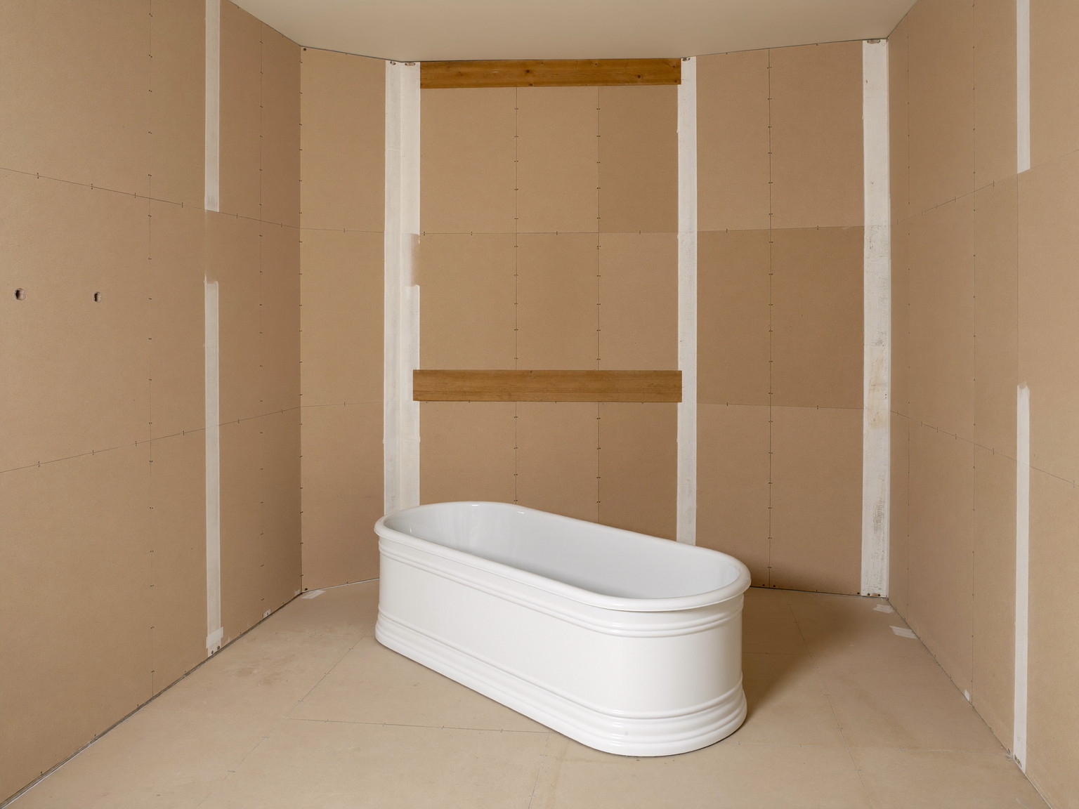 Mid-renovation bathroom in a historic Lexington colonial, tidy and completely vacant: fresh wall board fitted cleanly with battened seams