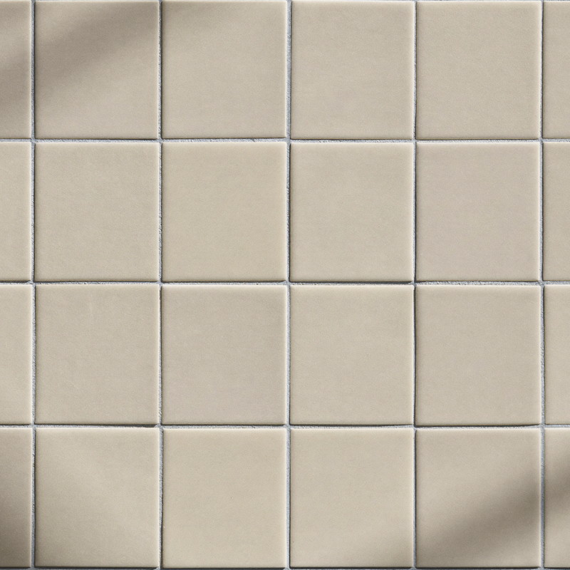Macro photograph of warm white square ceramic tile with soft satin glaze and thin pale-blue-gray grout lines, plain field tile only, every course straight